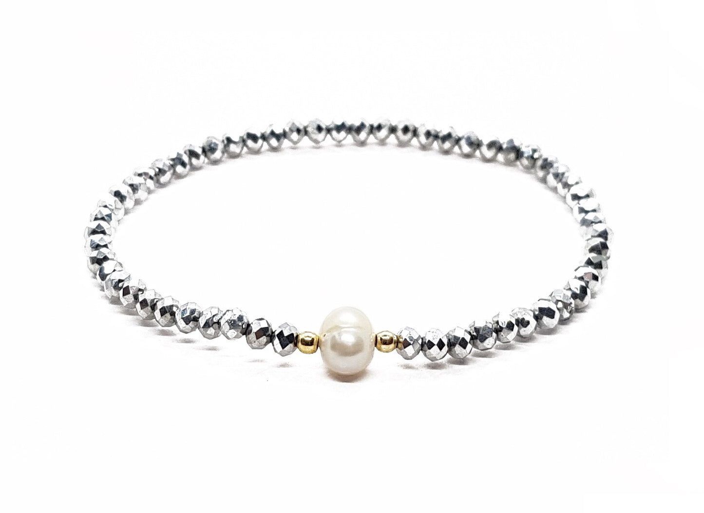 Pulsera de cristales plateados con perla natural