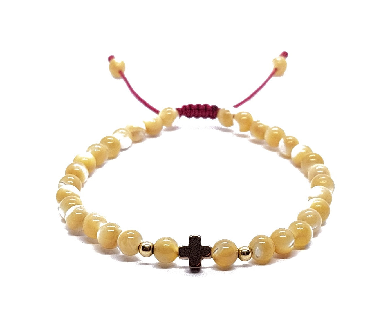 Pulsera de madre perla con cruz de hematita