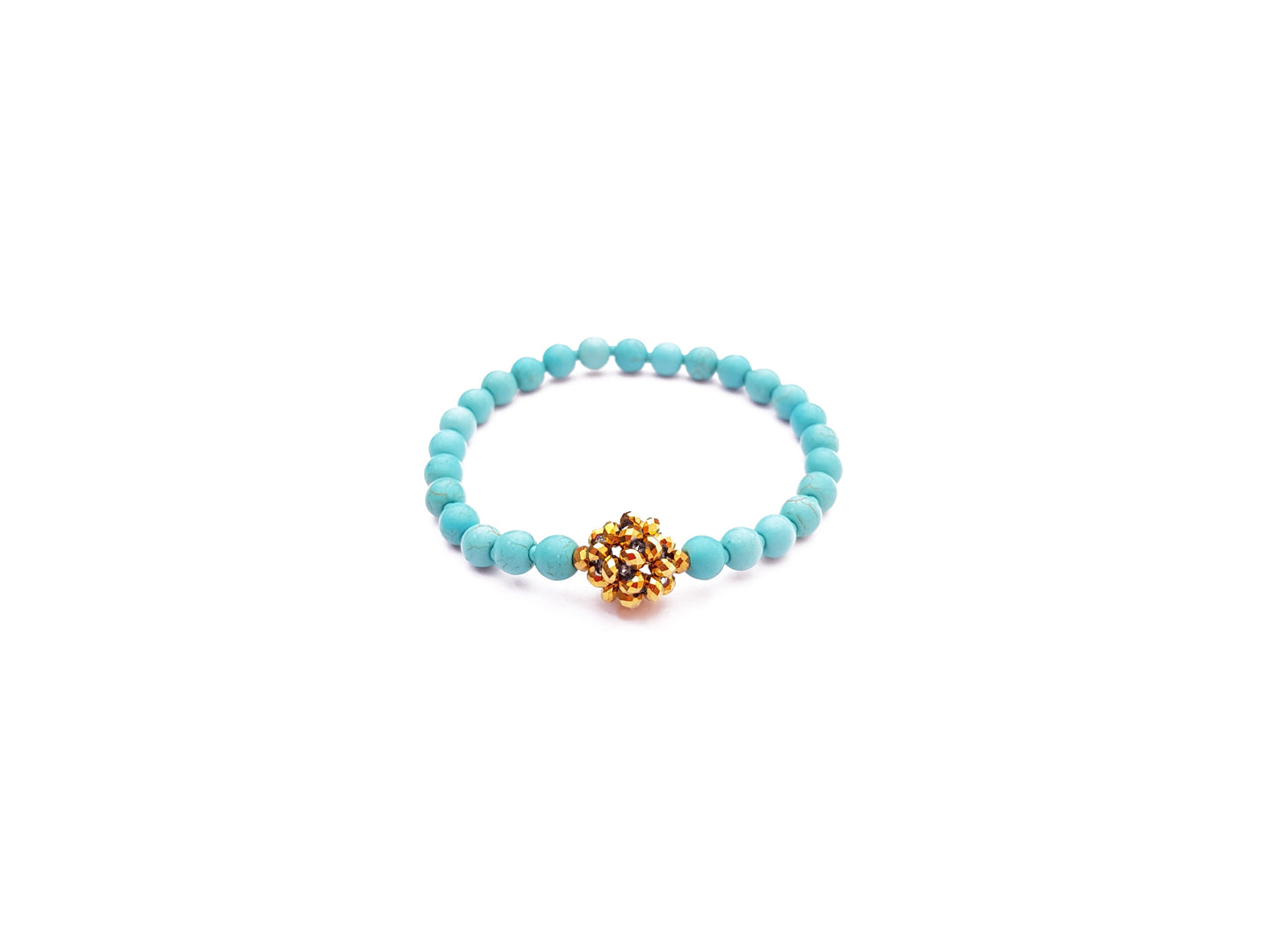 Pulsera turquesa con esfera dorada