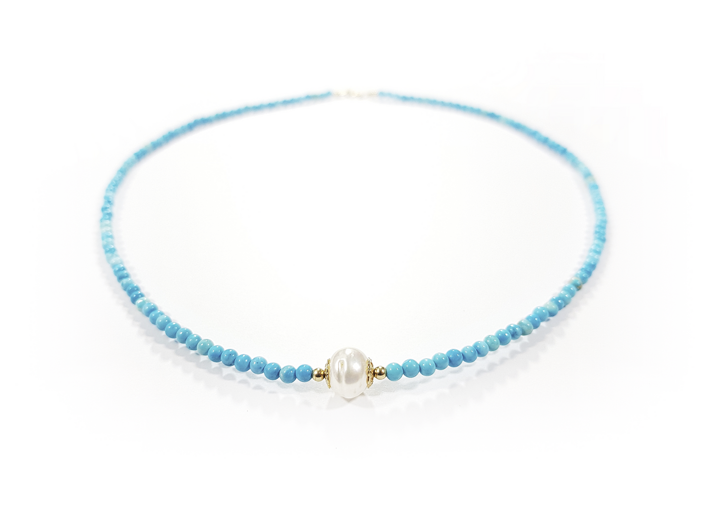 Gargantilla turquesa con perla natural al centro