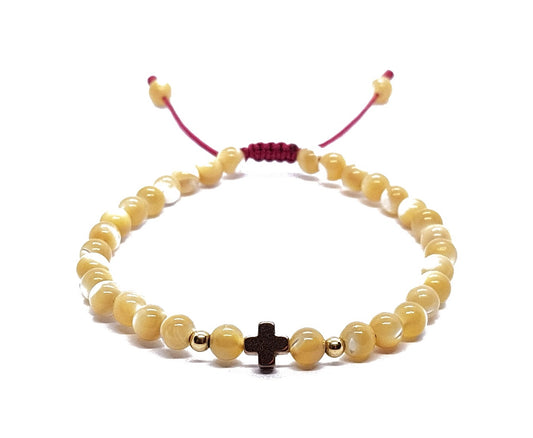Pulsera de madre perla con cruz de hematita