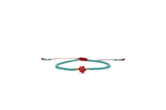 Pulsera turquesa con ojo turco flor rojo