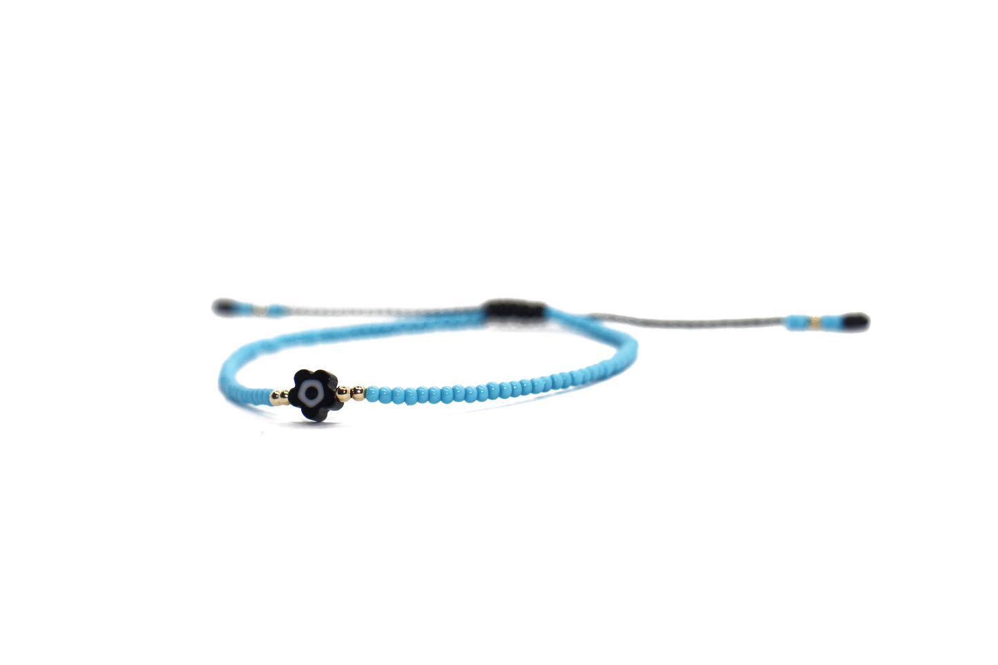 Pulsera azul con ojo turco flor negro