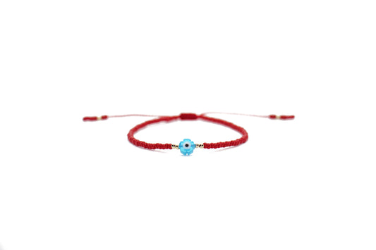 Pulsera roja con ojo turco flor azul claro