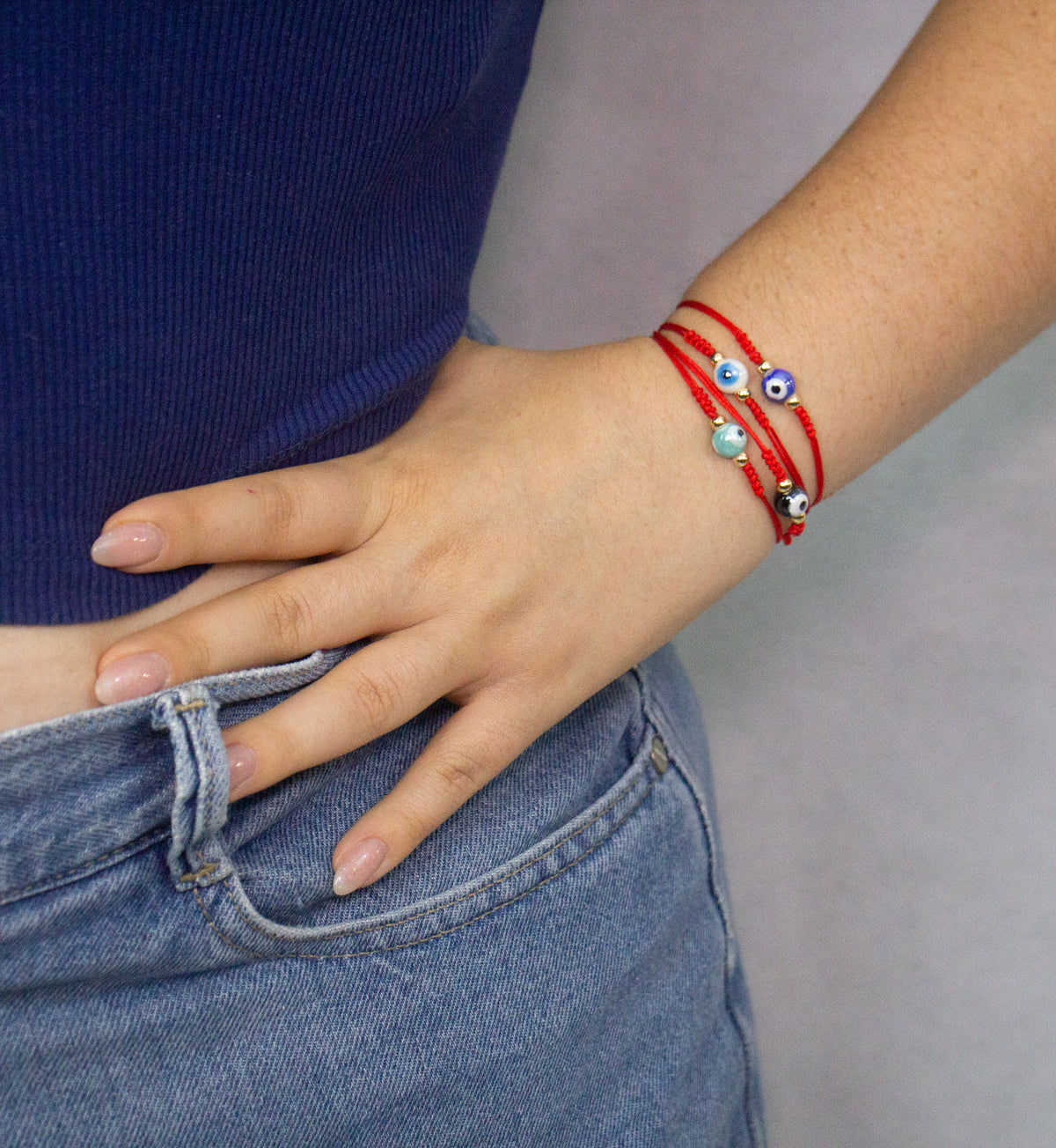 Pulsera Ojo Turco · Hilo rojo y chapa de oro de 14k