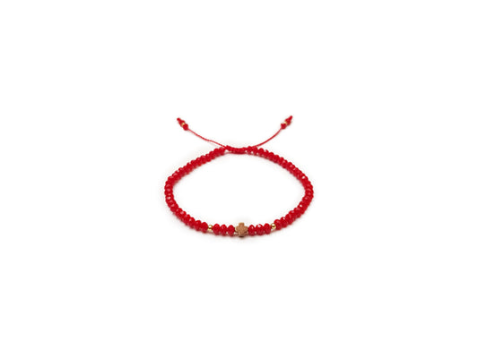 Pulsera de cristales rojos con cruz chica de hematita rosa