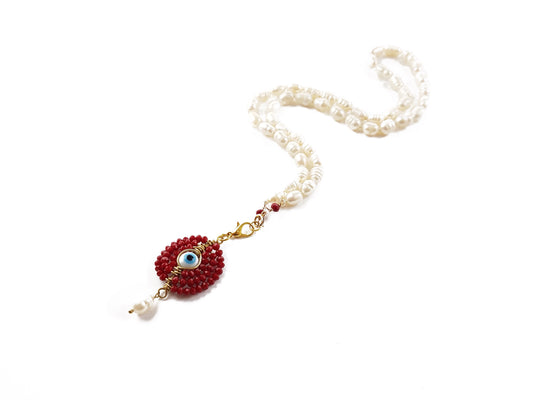 Gargantilla de perla natural con dije de ojo turco rojo